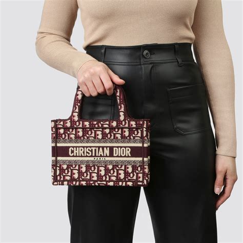 monogram dior book tote|pre owned christian dior bag.